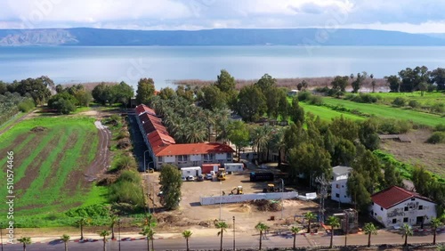 Aerial Panning Shot Of Guesthouses By Lake Kinneret photo