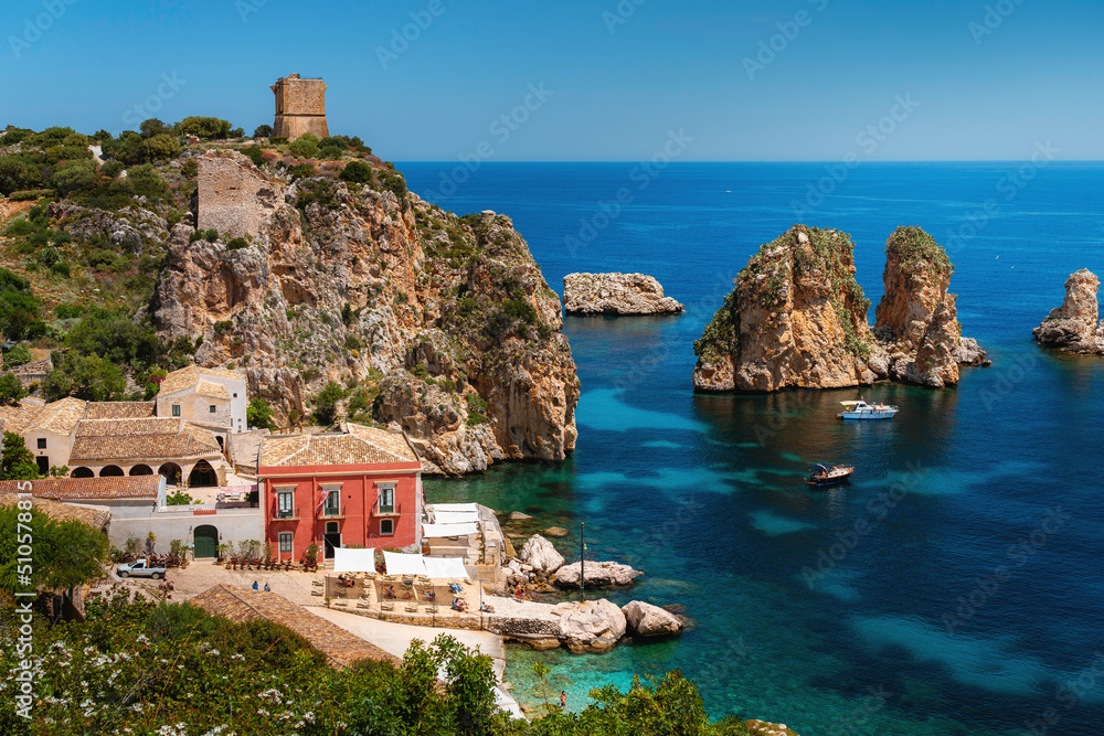 Scopello - one of the most beautiful places in Sicily, Italy. Visit card of the Mediterranean with crystal clear sea and amazing rock formations. 