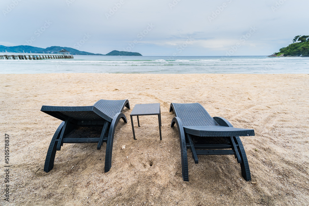 Beach Chairs in front of the sea beach - Holiday relaxation background Concept