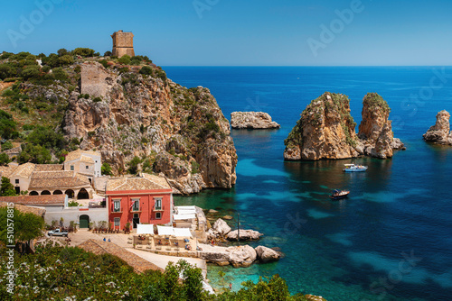 Scopello - one of the most beautiful places in Sicily, Italy. Visit card of the Mediterranean with crystal clear sea and amazing rock formations. 
