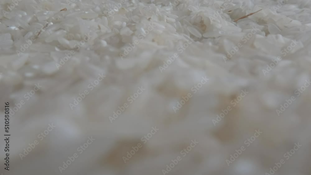 Rice grains that have been cleaned of husks, ready to be cooked and consumed Rice grains that have been cleaned of husks, ready to be cooked and consumed