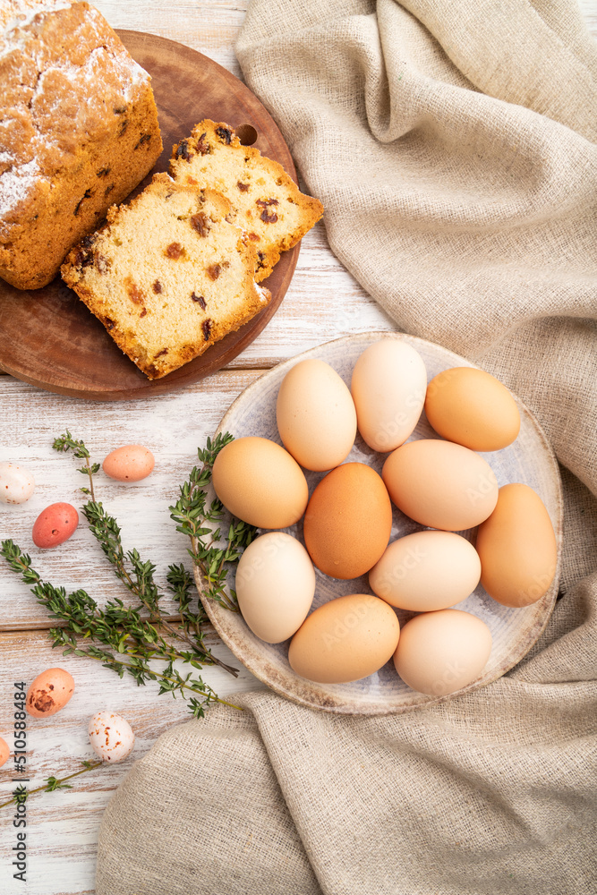 Homemade easter pie with raisins and eggs on plate on a white wooden background. top view, close up. Homemade easter pie with raisins and eggs on plate on a white wooden background. top view, close up.