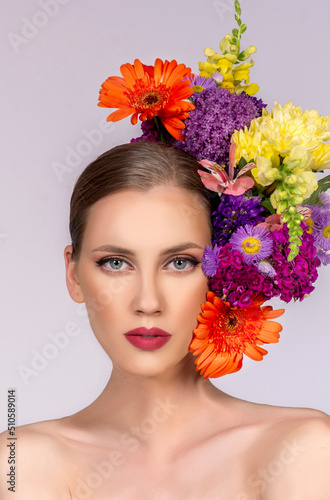 spring-summer make up colors, portrait of beautiful blond Caucasian woman with blossom flowers. Editorial series print ready, skincare and beauty concept