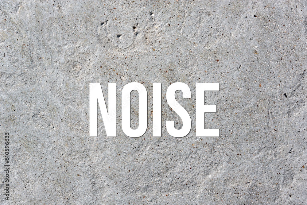 NOISE - word on concrete background. Cement floor, wall. NOISE - word on concrete background. Cement floor, wall.