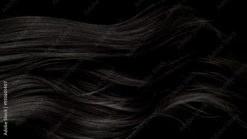 Super slow motion of wavy black hair in detail. Filmed on high speed cinema camera, 1000 fps. Super slow motion of wavy black hair in detail. Filmed on high speed cinema camera, 1000 fps.