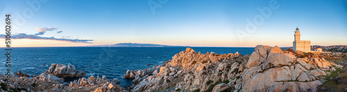 Panoramic tranquil scenery with lighthouse at Capo Testa Sardinia at sunset