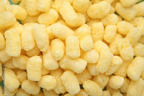 Yellow corn sticks close-up. Backgrounds and textures