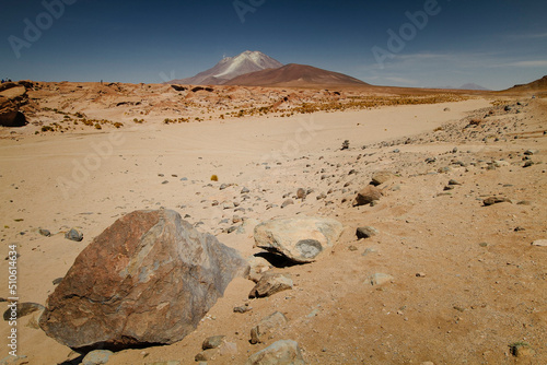 Volcanic moonlike landscape dunes, rocks and mountains on the border between Bolivia and Chile.