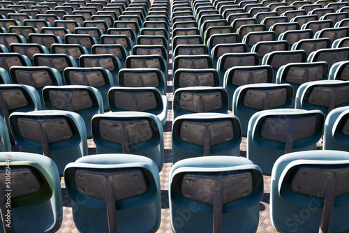 Empty Plastic Chairs at the Stadium