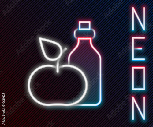 Glowing neon line Apple cider vinegar in bottle icon isolated on black background. Colorful outline concept. Vector