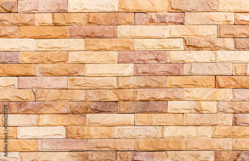 Brown brick wall texture with rough pattern Wallpaper background. Brick wall.