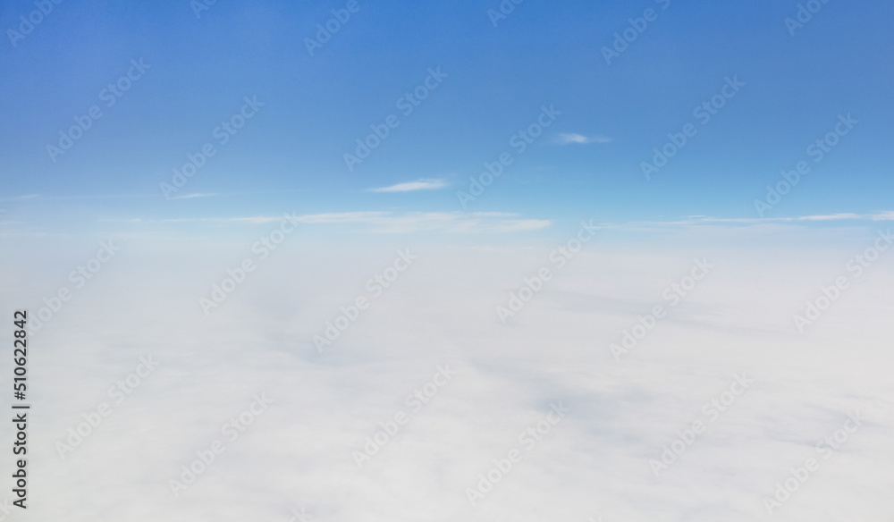 The sky above the clouds as seen from the plane. The sky above the clouds as seen from the plane.
