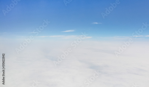 The sky above the clouds as seen from the plane.