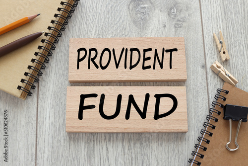 Provident Fund. lettering on wooden boards. wooden background photo