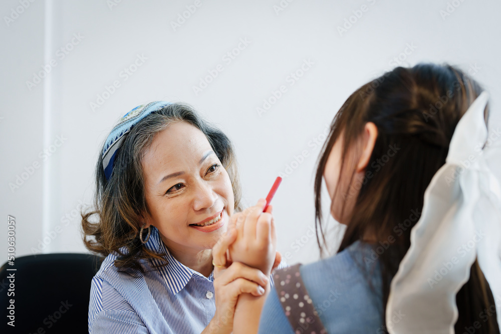 Asian portrait, grandchild granddaughter grandma grandmother and granddaughter happily join in activities to enhance skills for grandchildren Asian portrait, grandchild granddaughter grandma grandmother and granddaughter happily join in activities to enhance skills for grandchildren