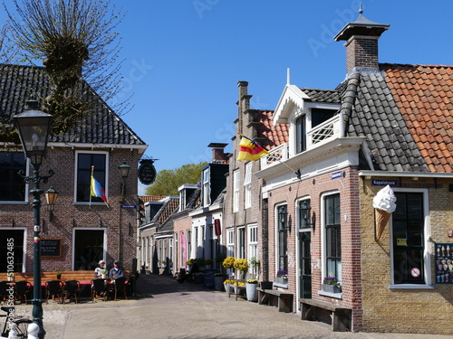 The tranquil square in the middle of (Dutch) Sloten (Frisian) Sleat, Friesland, The Netherlands photo