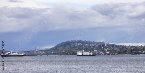 Industrial Sites, Second Narrows Bridge and Burnaby Mountain in Background. Panoramic View. Vancouver, British Columbia, Canada. photo