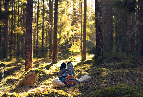 Fototapeta Naklejka Na Ścianę i Meble -  Person relaxing and resting in the forest