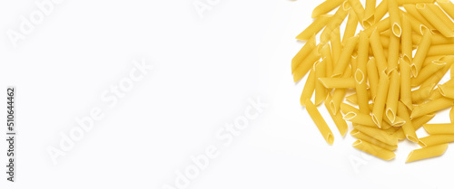 Raw Italian pasta on a white background. Top view  flat lay. Banner.