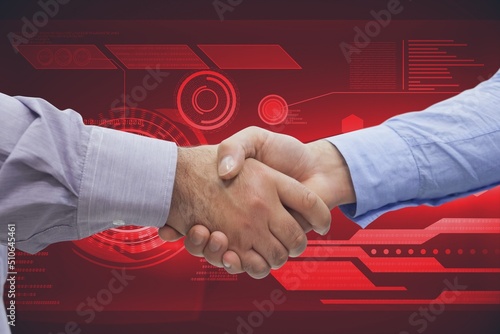 Hands of two diverse businessmen shaking hands against digital interface with data processing