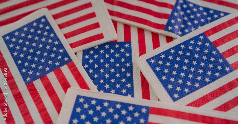 Close up view of multiple miniature american flags with copy space