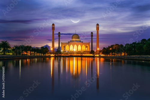 Landscape view during sunset with Mosque and reflections in the water