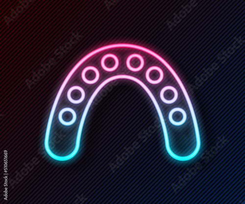 Glowing neon line Mouth guard boxer icon isolated on black background. Vector