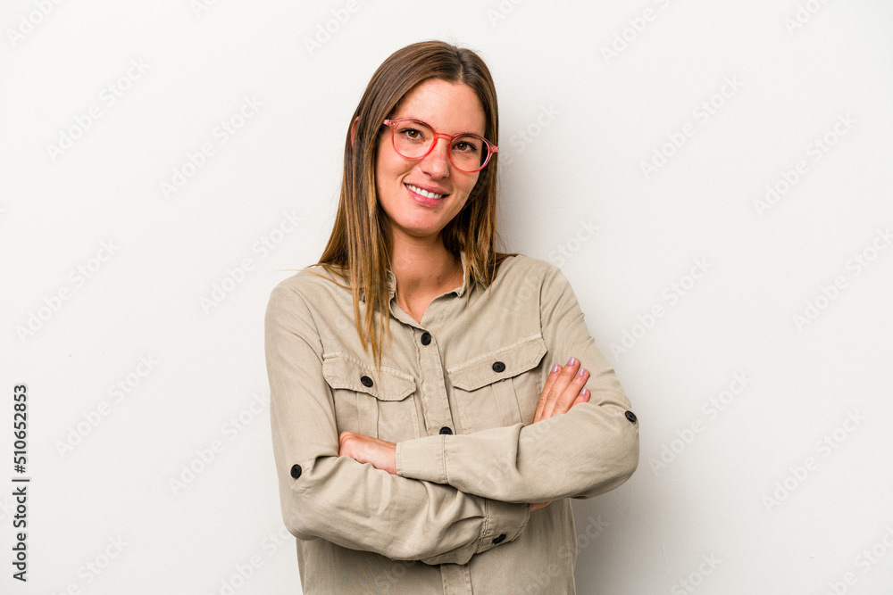 Young caucasian pregnant woman isolated on white background who feels confident, crossing arms with determination.
