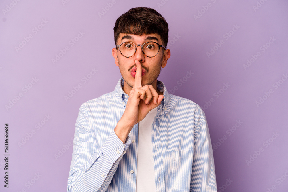 Young caucasian man isolated on purple background keeping a secret or asking for silence. Young caucasian man isolated on purple background keeping a secret or asking for silence.