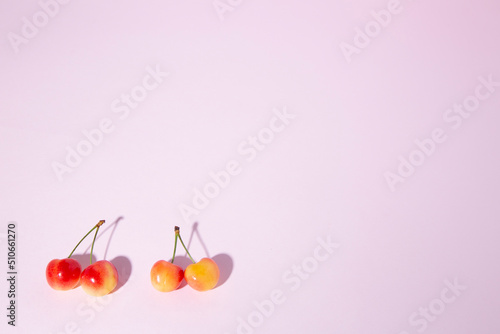 cherry on a pink background