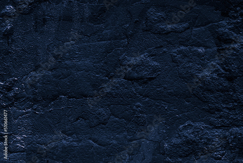 Dark stone wall. Rock texture. Stone background. Stone texture for designers. Wall abstraction. Paint spots. Rock surface with cracks. Abstract texture.