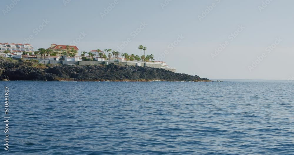 Alcala , Santa Cruz de Tenerife. Spain. Black volcanic stones and sandy beach on Tenerife, Canary Islands, Spain. Alcala , Santa Cruz de Tenerife. Spain. Black volcanic stones and sandy beach on Tenerife, Canary Islands, Spain.