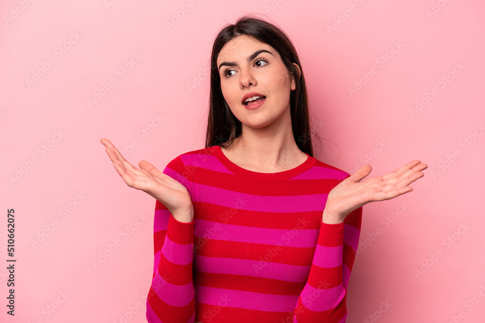 Young caucasian woman isolated on pink background joyful laughing a lot. Happiness concept. Young caucasian woman isolated on pink background joyful laughing a lot. Happiness concept.
