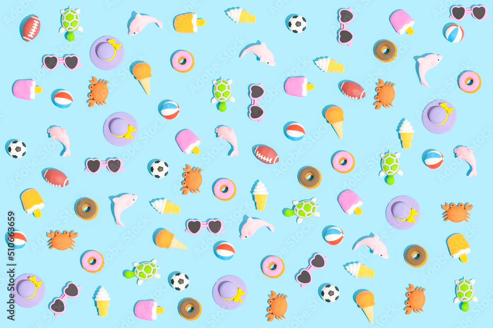 Trendy sunlight Summer pattern made with various summer things on bright light blue background. Minimal summer vacation concept. Trendy sunlight Summer pattern made with various summer things on bright light blue background. Minimal summer vacation concept.