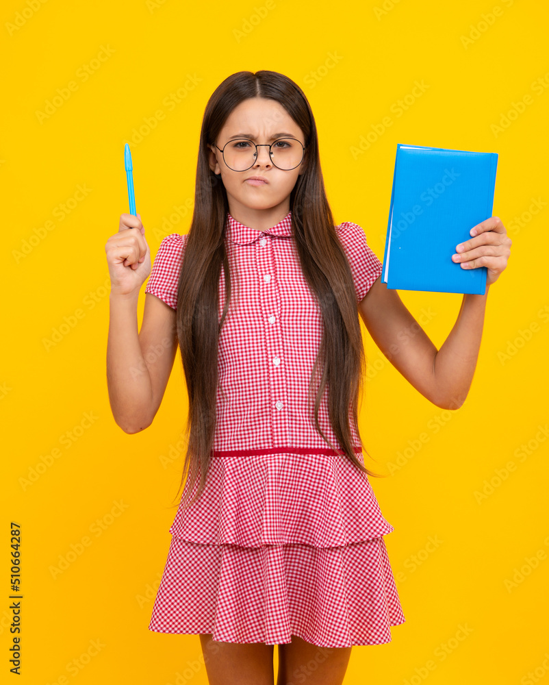 Back to school. Portrait of teenage school girl with books. Children school and education concept. Schoolgirl student. Unhappy upset teenager girl. Back to school. Portrait of teenage school girl with books. Children school and education concept. Schoolgirl student. Unhappy upset teenager girl.
