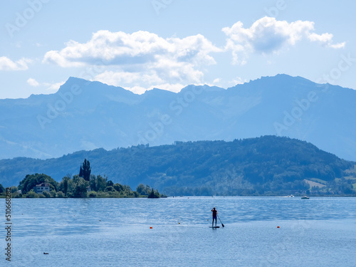 Leisure activities on the shores of the Upper Zurich Lake (Obersee) near Rapperswil, St. Gallen, Switzerland