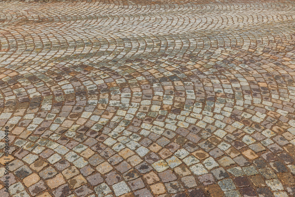 Beautiful view of texture of paving slabs paved pavement with old cobblestones. Sweden. Beautiful view of texture of paving slabs paved pavement with old cobblestones. Sweden.