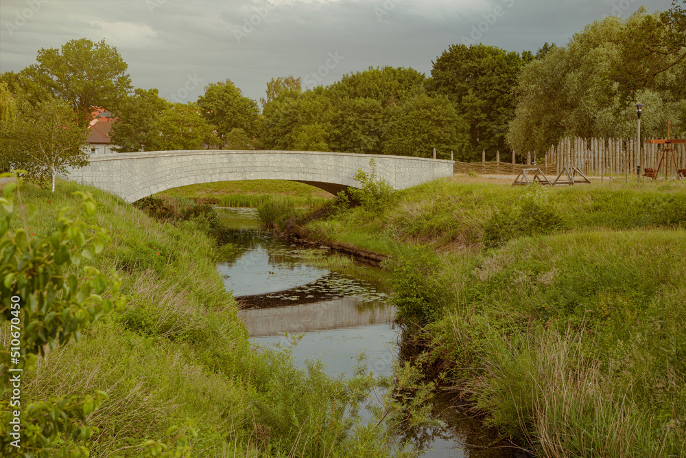 Fototapeta premium Village canal and bridge in Holland