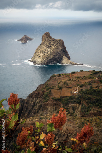 Vista de los Roques de Anaga y alguna de las pocas casas habitadas que quedan en la ladera de la montaña, Parque Rural de Anaga, Tenerife, Islas Canarias, España
 photo