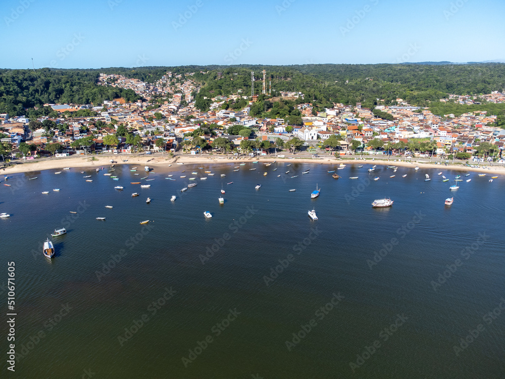 Beautiful fishing village with its boats on a river beach