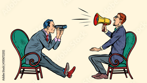 a man with a bullhorn megaphone loudspeaker and a second man with binoculars. Two interlocutors. negotiations discussion concept