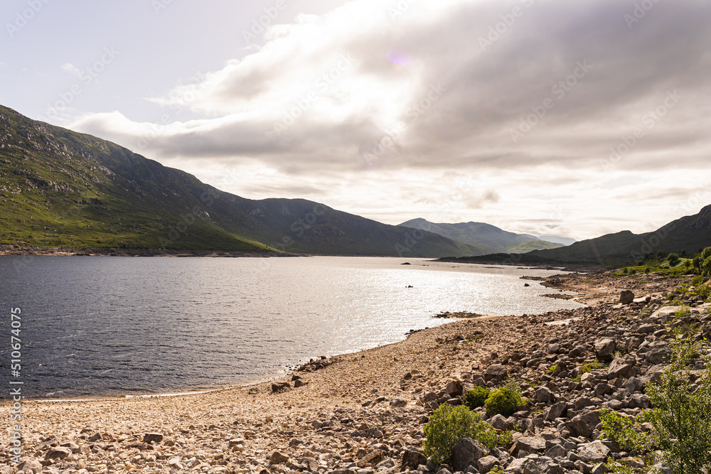 Landscape photo of a lake in the north of Scotland during a summer evening