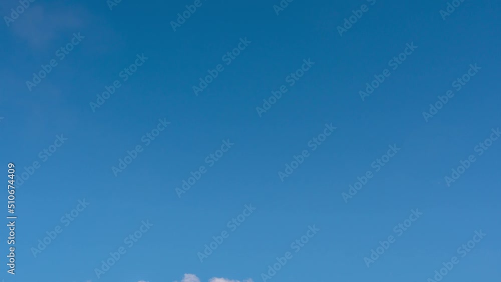 clear blue sky in sunny summer season, beautiful day for spring warm season atmosphere. nature environment clouds and sky timelapse. wide space with dark blue color in the air. 4k nature background clear blue sky in sunny summer season, beautiful day for spring warm season atmosphere. nature environment clouds and sky timelapse. wide space with dark blue color in the air. 4k nature background