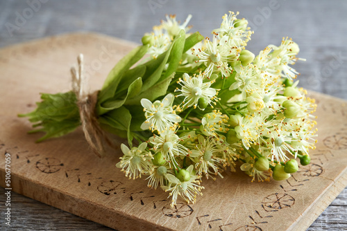 Fresh lime tree flowers on a table