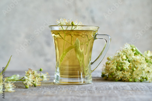 A cup of herbal tea with linden blossoms