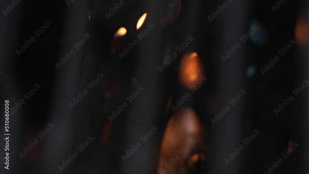 This video shows a close up, macro view of a lighter igniting a gas grill for a cookout. This video shows a close up, macro view of a lighter igniting a gas grill for a cookout.