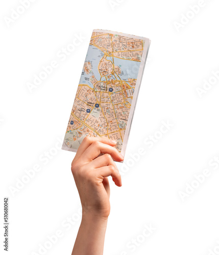 Woman hand holding tourist map, guide isolated on white background. Travelling, going to trip, visiting places of interests, attractions concept. High quality photo photo