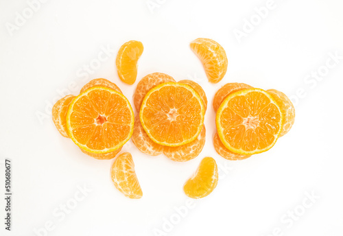 selective focus Tangerine or komola in a plate isolated on white background  top view