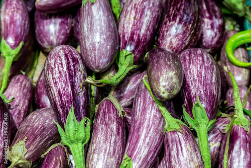 Aubergines for sale in a market