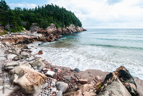 Print op canvas Cobblestone and rocky shoreline on Black Brook beach, Cape Breton Highlands Nova Scotia, Canada